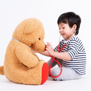 little-boy-playing-doctor-with-teddy-bear (1) little-boy-playing-doctor-with-teddy-bear (1)